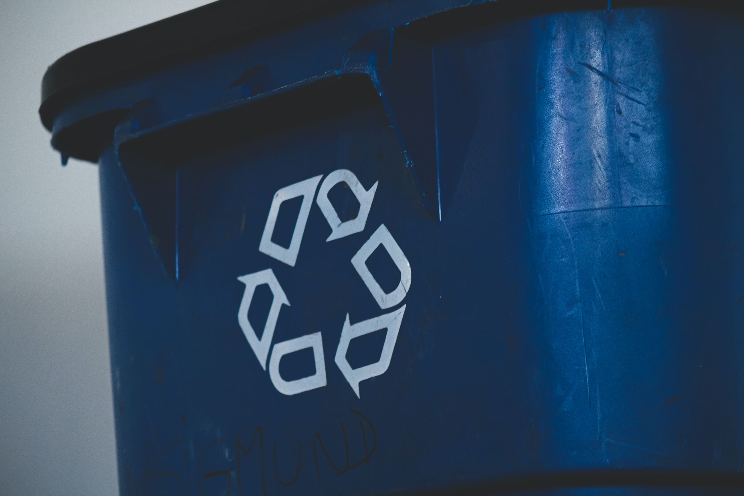 Recycling Symbol on the side of a trash can